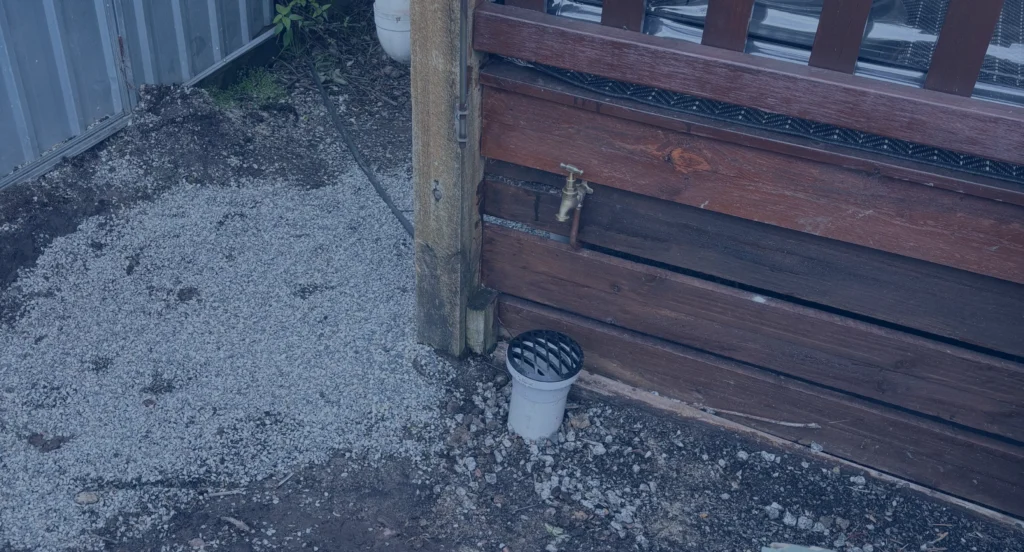 image of a tap and gully trap